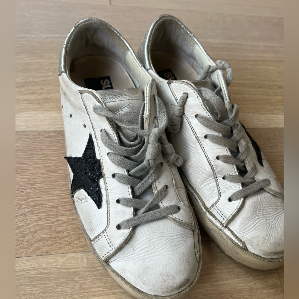 Golden goose size 36- black glitter star